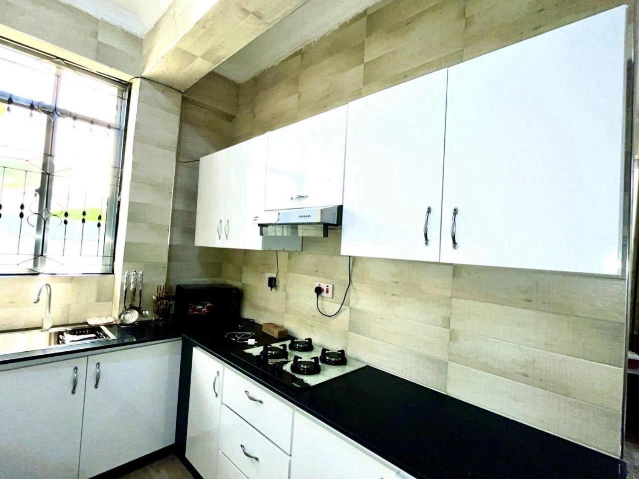 R&K Two Bedroom Apartment Dar-es-Salaam Eksteriør bilde